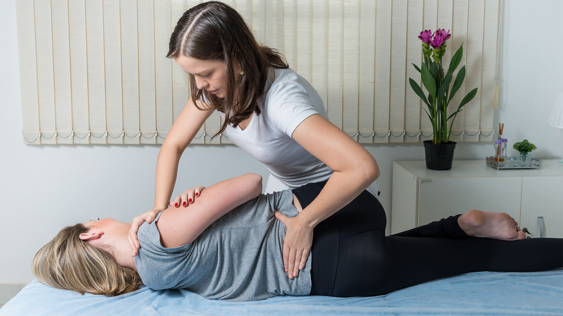 Chiropractor working with a patient