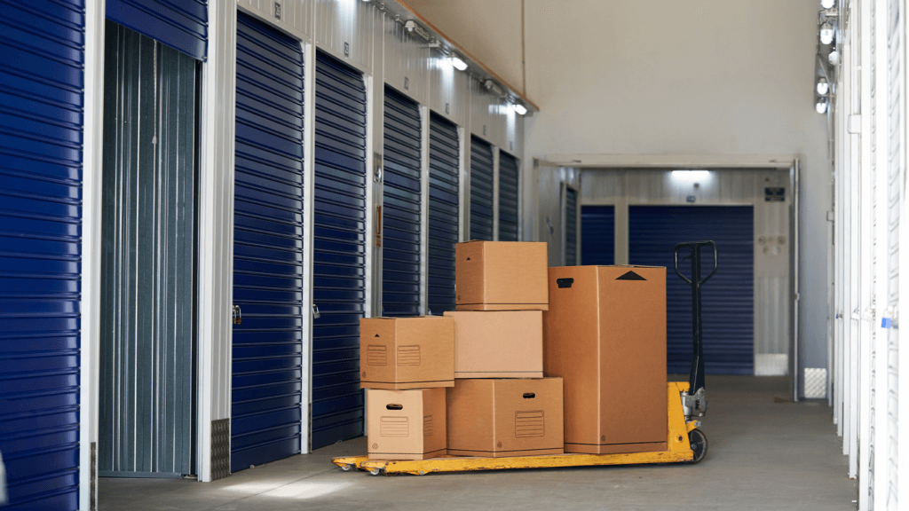 Storage in an industrial building for rental to entrepreneurs or individuals with recyclable cardboard boxes on top of a pallet rack
