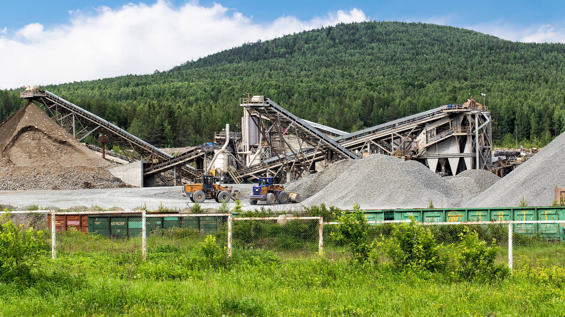 Open pit mining and processing plant for crushed stone,