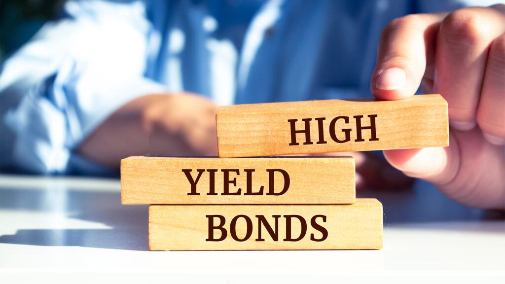 Wooden blocks with words 'High yield bonds'.